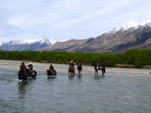 crossing-a-stream-on-horseback-new-zealand
