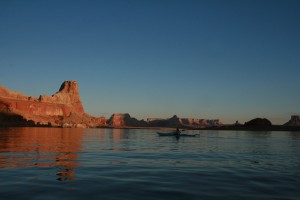 gina-paddling-a-kayak-at-dusk-lake-powell-arizona