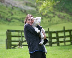 gina-holding-a-lamb-new-zealand