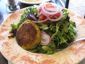 Fresh greens salad with goat cheese