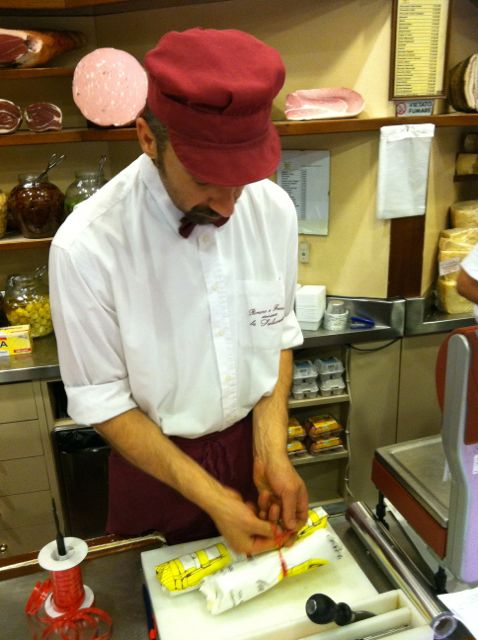 meat-man-wrapping-my-salumi-bologna-italy.jpg image-meat-man-wrapping-my-salumi-bologna-italy